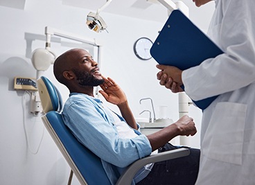 Man smiling at the dentist