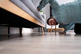 Person searching for a misplaced Invisalign case