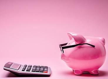 Piggy bank and calculator