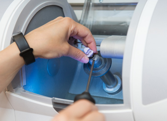 CEREC milling machine creating same-day crown in York 