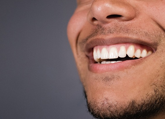 a close-up of a man’s smile