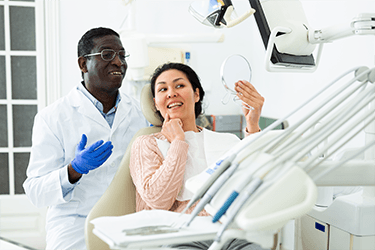 Woman smiling at the dentist