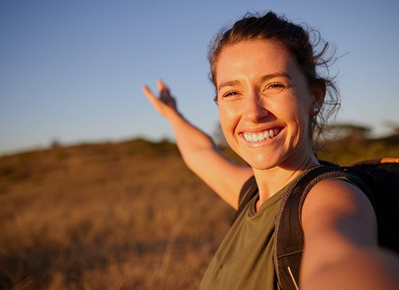 Woman smiling on a hike
