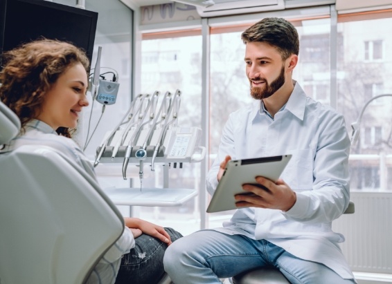 Dentist showing a patient advanced dental technology in York